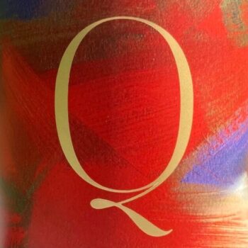 Old Vine 1901 Mixed Field Blend 2019; A square label with an abstract background mostly in shades of red, with a dash of purple and gold, with a large golden capital Q