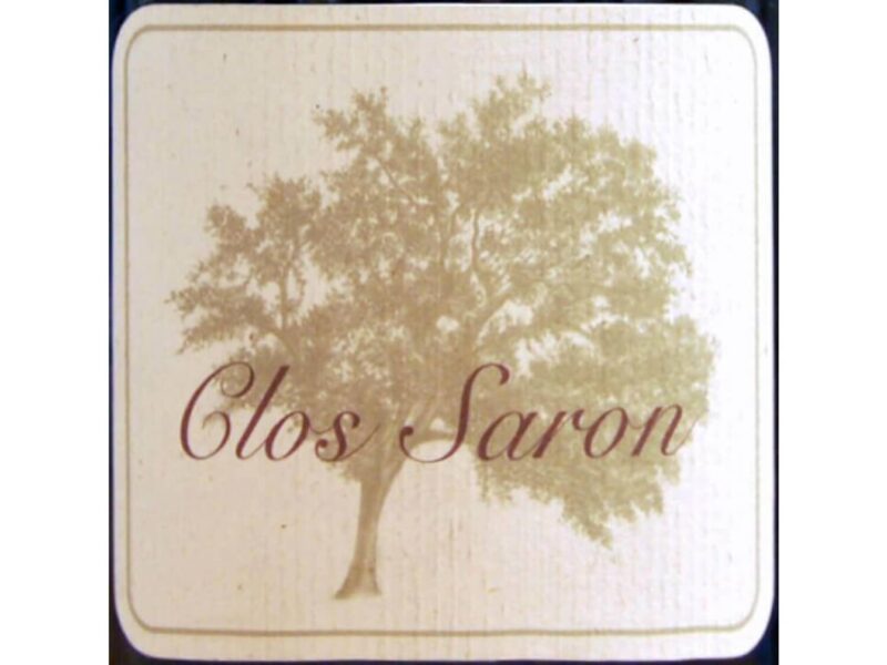 Clos Saron; Square label, beige fading to white, with dark blue border.Darker beige tree silhouette, brown script.