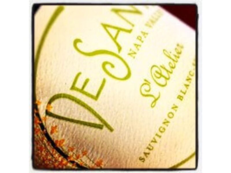 DeSante L'Atelier 2018; Black bordered square label showing beige bottle label with lime green text